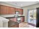 Functional kitchen offering ample cabinet space and modern appliances, ideal for culinary enthusiasts at 9676 Godwin St, Ladson, SC 29456