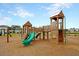 Playground offers a slide and lookout tower with community homes in the background at 9676 Godwin St, Ladson, SC 29456