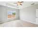 This bedroom features light, airy walls, a ceiling fan, and a window with a view at 1007 Halfacre Ln, Ladson, SC 29456