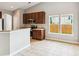 The kitchen shows a stainless microwave and a big window at 1007 Halfacre Ln, Ladson, SC 29456