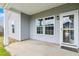 A cozy covered porch invites you to relax and enjoy the peaceful surroundings at 1007 Halfacre Ln, Ladson, SC 29456