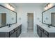 Dual vanity bathroom with modern fixtures, marble floors, and and sinks at 101 Firebrick Way, Summerville, SC 29483
