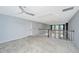 Spacious upstairs loft area with a ceiling fan, neutral carpet, and natural light creating a cozy retreat at 101 Firebrick Way, Summerville, SC 29483