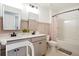 Bathroom with double sink vanity and tiled bathtub shower at 1052 Sago Palm Ct, Mount Pleasant, SC 29429