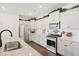 Bright, modern kitchen features stainless steel appliances, white cabinetry, subway tile backsplash and ample counter space at 1052 Sago Palm Ct, Mount Pleasant, SC 29429