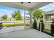 Relaxing screened porch with scenic views, offering a tranquil space for outdoor enjoyment and entertaining at 1052 Sago Palm Ct, Mount Pleasant, SC 29429