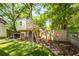 Playful backyard with a treehouse, hot tub and artificial turf at 1070 Blue Marlin Dr, Charleston, SC 29412