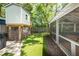 Well maintained backyard featuring a treehouse, hot tub, and screened in porch at 1070 Blue Marlin Dr, Charleston, SC 29412