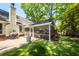 Exterior of house with screened-in porch and manicured backyard at 1070 Blue Marlin Dr, Charleston, SC 29412