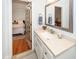 Clean bathroom featuring white vanity and a view into the Primary bedroom suite at 1070 Blue Marlin Dr, Charleston, SC 29412
