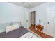 Comfortable bedroom features hardwood floors and neutral tones, creating a relaxing atmosphere at 1070 Blue Marlin Dr, Charleston, SC 29412