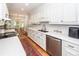 Bright kitchen featuring white cabinets, quartz countertops, and stainless steel appliances at 1070 Blue Marlin Dr, Charleston, SC 29412