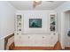 Cozy living room features a built-in media center with storage and a cushioned bench seat at 1070 Blue Marlin Dr, Charleston, SC 29412
