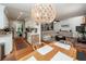Open floor plan view into the living room featuring hardwood floors and neutral tones at 1070 Blue Marlin Dr, Charleston, SC 29412