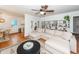 Spacious living room with hardwood floors, built-in shelving, and a comfortable sectional sofa at 1070 Blue Marlin Dr, Charleston, SC 29412