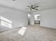 Large bedroom with neutral carpet, a ceiling fan, and an ensuite bathroom at 112 Huckleberry Ln, Summerville, SC 29485