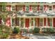 Close-up of the home's inviting entrance with a red front door and brick columns at 112 Huckleberry Ln, Summerville, SC 29485