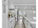 Modern kitchen features stainless steel appliances, quartz countertops, and ample cabinet space at 112 Huckleberry Ln, Summerville, SC 29485