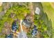An aerial view showcases the property's location, mature trees, and proximity to a golf course at 1164 Out Of Bounds Dr, Summerville, SC 29485