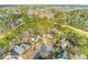 An aerial view showcasing the neighborhood homes surrounded by lush trees and landscaping near the golf course at 1164 Out Of Bounds Dr, Summerville, SC 29485