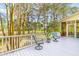 Inviting back deck area with chairs overlooking the backyard and trees at 1164 Out Of Bounds Dr, Summerville, SC 29485