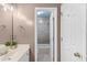 Bathroom with a vanity, light fixture, and a view into the tiled shower/tub combo at 1164 Out Of Bounds Dr, Summerville, SC 29485