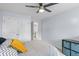 Neutral bedroom with a ceiling fan and closet storage with a doorway leading to another room at 1164 Out Of Bounds Dr, Summerville, SC 29485