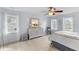 Bright bedroom with neutral decor, two large windows, and carpet at 1164 Out Of Bounds Dr, Summerville, SC 29485