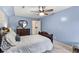Bedroom with an ornate wooden bed, bookshelf and other furniture and a ceiling fan at 1164 Out Of Bounds Dr, Summerville, SC 29485