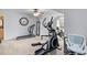 Home gym with varied workout equipment, a ceiling fan and arched windows at 1164 Out Of Bounds Dr, Summerville, SC 29485