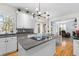 Modern kitchen with island, granite countertops, and stainless appliances at 1164 Out Of Bounds Dr, Summerville, SC 29485