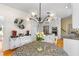 Chic kitchen with granite counters, pendant lighting, and white cabinets at 1164 Out Of Bounds Dr, Summerville, SC 29485