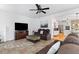 Bright living room flowing into the kitchen with open floor plan at 1164 Out Of Bounds Dr, Summerville, SC 29485