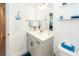 Bathroom with vanity, toilet, and nautical-themed decorations at 118 Alpine Rd, Summerville, SC 29485