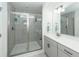 Modern bathroom features a glass-enclosed shower and sleek vanity with contemporary fixtures at 118 Alpine Rd, Summerville, SC 29485