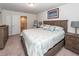 Spacious bedroom with a queen-sized bed, soft lighting, and stylish coastal-themed decor at 118 Alpine Rd, Summerville, SC 29485