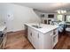 Bright kitchen with stainless steel appliances, a spacious island, and hardwood floors at 118 Alpine Rd, Summerville, SC 29485