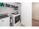 Well-organized laundry room features a modern washer and dryer, shelving, and ample storage space at 118 Alpine Rd, Summerville, SC 29485