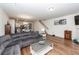 Open concept floor plan with living room leading into the kitchen and stairs to the second floor. Hardwood flooring at 118 Alpine Rd, Summerville, SC 29485