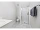 Modern bathroom with a glass-enclosed shower, toilet, and single vanity sink at 122 Lucia St, Charleston, SC 29492