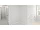 Bright room with a storage area, white walls, carpeted floors, and two skylights at 122 Lucia St, Charleston, SC 29492