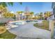 Inviting swimming pool surrounded by lush landscaping and comfortable lounge chairs at 122 Lucia St, Charleston, SC 29492
