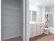 Clean bathroom features dual sink vanity, mirror, and shower-tub combo at 131 Cloverleaf St, Summerville, SC 29483