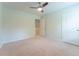 Cozy bedroom featuring ceiling fan, plush carpet, and natural light at 131 Cloverleaf St, Summerville, SC 29483