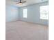 Bedroom featuring neutral walls, carpet, a ceiling fan, and windows that provide natural light at 131 Cloverleaf St, Summerville, SC 29483