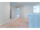Upstairs hallway featuring neutral walls, carpet, and doors to the bedrooms and bathrooms at 131 Cloverleaf St, Summerville, SC 29483