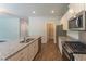 Updated kitchen with granite countertops, stainless steel appliances, and ample storage space at 131 Cloverleaf St, Summerville, SC 29483