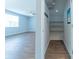 Bright living room featuring stylish wood-look flooring and a ceiling fan for added comfort at 131 Cloverleaf St, Summerville, SC 29483
