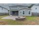 Spacious backyard with a patio and fire pit, perfect for outdoor entertaining at 138 Shadybrook Dr, Summerville, SC 29486