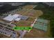 Aerial view of Cane Bay YMCA featuring tennis courts, baseball field, and soccer field at 138 Shadybrook Dr, Summerville, SC 29486